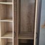 JYSK MANDERUP 3-door wardrobe in a wild oak finish, featuring slatted-style louvered doors. Image 3