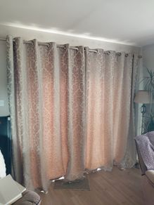 curtains. Two sets of curtains or one set available