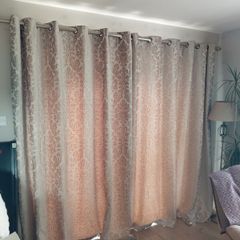 curtains. Two sets of curtains or one set available