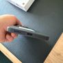 Xiaomi 14T phone with earbuds Image 3