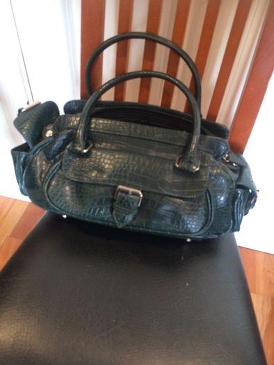 Hand bags. Rucksacks, clutch bags, purses