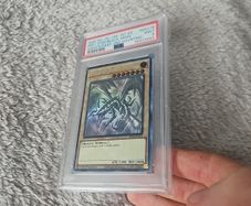 PSA 9 Red-Eyes Black Dragon (Ghost Rare)