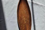 Hand-carved leaf-shaped bow