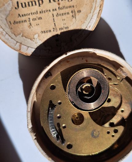 Lot of Antique Watch Parts in Containers