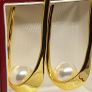Beautiful earrings with pearls. Image 2