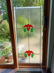 Large stained glass panel.135x54 cm.
