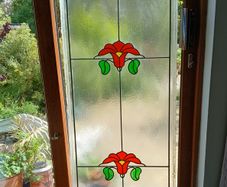 Large stained glass panel.135x54 cm.