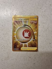 Welcoming Latern Gold Secret Rare Trainer Pokemon Card