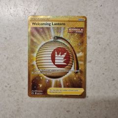 Welcoming Latern Gold Secret Rare Trainer Pokemon Card