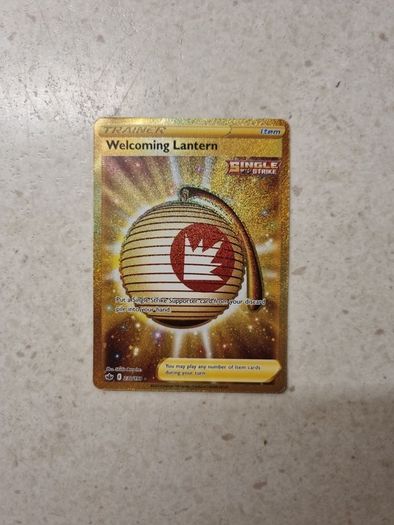 Welcoming Latern Gold Secret Rare Trainer Pokemon Card