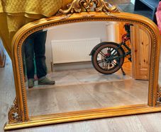 large ornate gold mirror