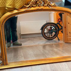 large ornate gold mirror