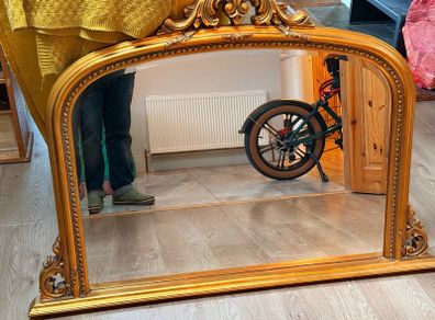 large ornate gold mirror