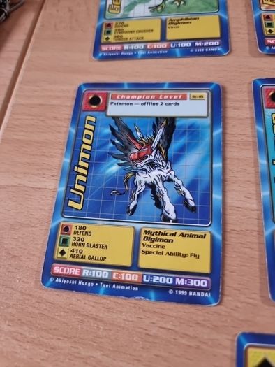 13 Champion level Digimon cards. 1999.