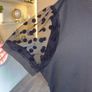 Ladies Black Short-sleeve Top Features Sheer polka-dot mesh sleeves Image 5