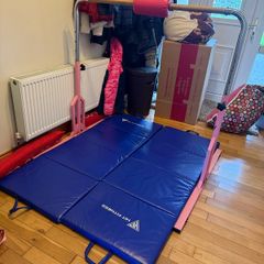 Gymnastics bar and mats