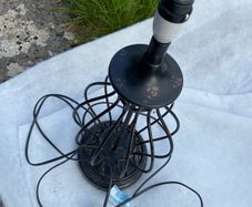 Heavy ornate metal lamp stand
