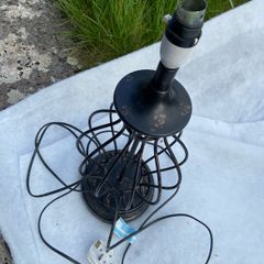 Heavy ornate metal lamp stand