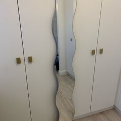 Curved Ripple Effect Mirror