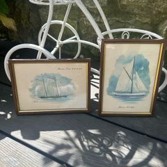 Two small framed prints of boats