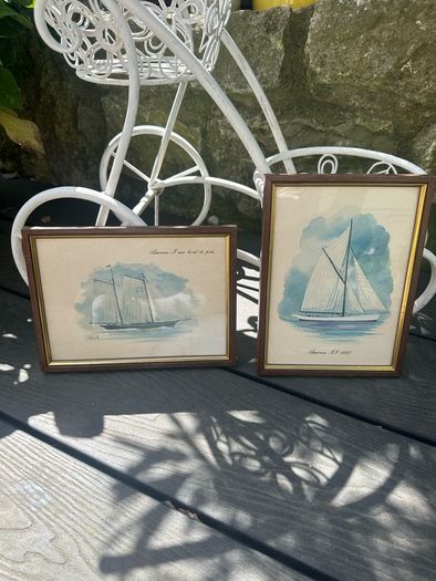 Two small framed prints of boats