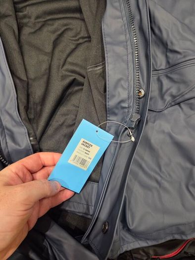 Waterproof jacket and trouser over alls