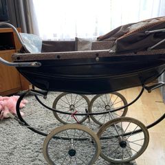 Vintage silver cross dolls pram