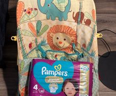 bouncer and pampers size 4