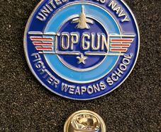 Top gun, fighter weapons school, pin back badge.