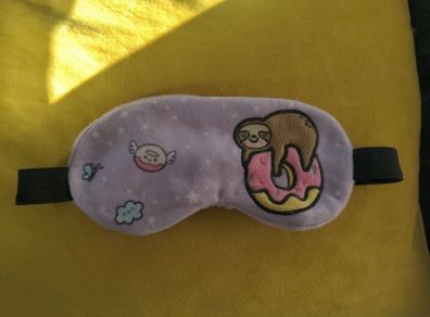 Girls sloth on a donut eyeask