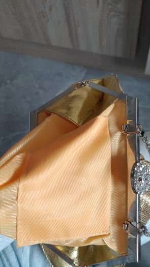 Gold sequin with rinstones clutch