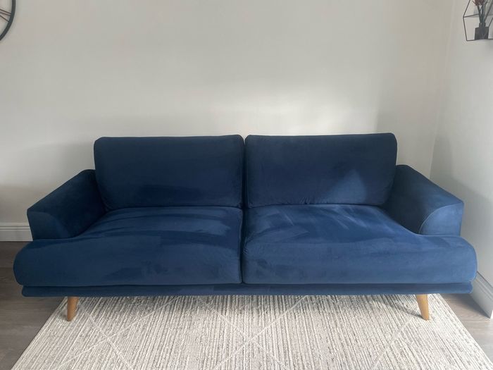Navy velvet sofa and cuddle chair from Michael Murphy furniture