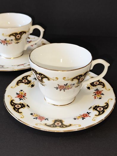A Pair of Royal Sutherland Bone China Teacups and Saucers in the Balmoral Pattern