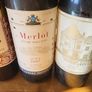 Full unopened wine bottles for display Image 4
