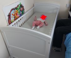 White cot / toddler bed.