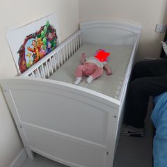 White cot / toddler bed.