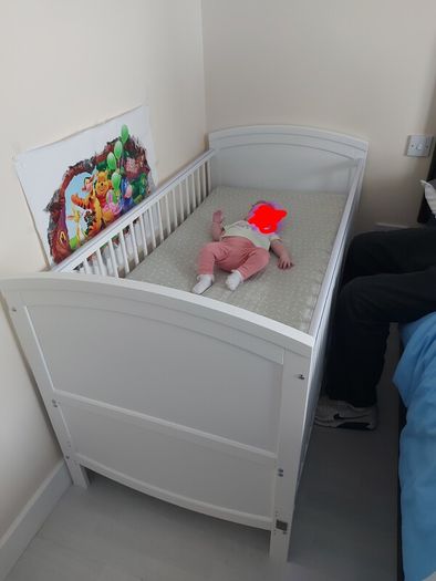 White cot / toddler bed.