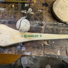 Kids hurl and sliothar