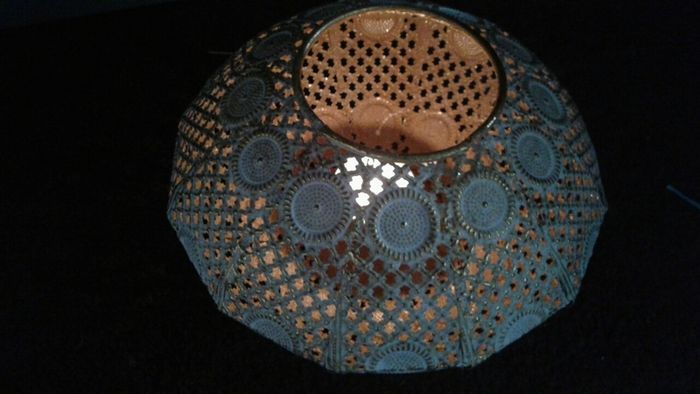 Decorative metal candle holder