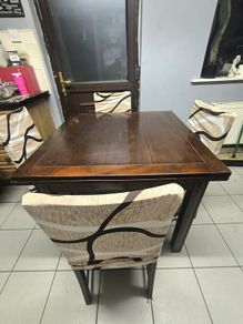 extendable table and 4 chairs