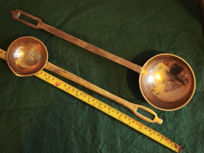Pair of brass ladles
