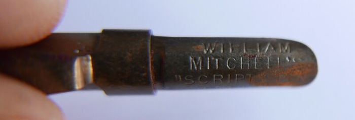Vintage dip pen with collection of assorted nibs