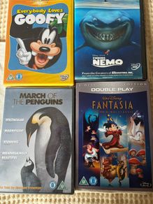 Four DVD's Fantasia (new) Goofy / March if the Penguins  & Nemo.