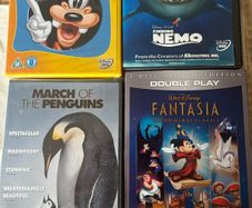Four DVD's Fantasia (new) Goofy / March if the Penguins  & Nemo.