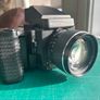Mamiya 645 Super Kit; Near Mint Condition Recently serviced Mamiya 645 Super with Tamron Sekkor 80mm 1.9 lens; Mamiya 645 AE Prism Finder; Mamiya 645 Super Waist Finder Viewer with magnifier; Mamiya 645 Super Motor Power Winder Grip; Darkslide; Extra Film Image 4