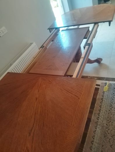 large Extenable Solid Wooden Dining Room Table and Chairs