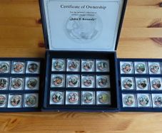 JFK cased coin set of 36 Eisenhower Ike Dollar coins