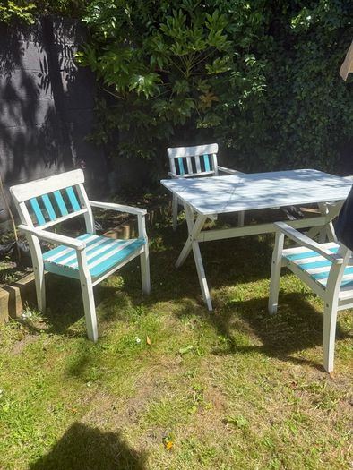 garden table and four chairs