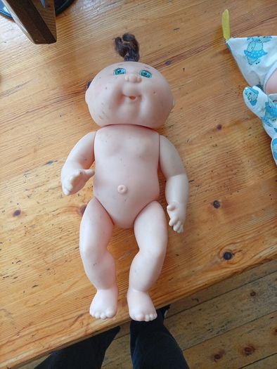 Cabbage patch doll and glo worm doll