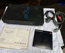 PS2 with instructions & cables , No controllers